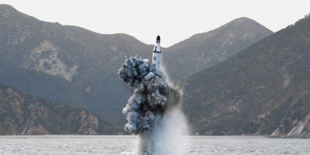 North Korean leader Kim Jong Un guides on the spot the underwater test-fire of strategic submarine ballistic missile in this undated photo released by North Korea's Korean Central News Agency (KCNA) in Pyongyang on April 24, 2016. KCNA/via REUTERS. ATTENTION EDITORS - THIS IMAGE WAS PROVIDED BY A THIRD PARTY. EDITORIAL USE ONLY. REUTERS IS UNABLE TO INDEPENDENTLY VERIFY THIS IMAGE. SOUTH KOREA OUT. TPX IMAGES OF THE DAY