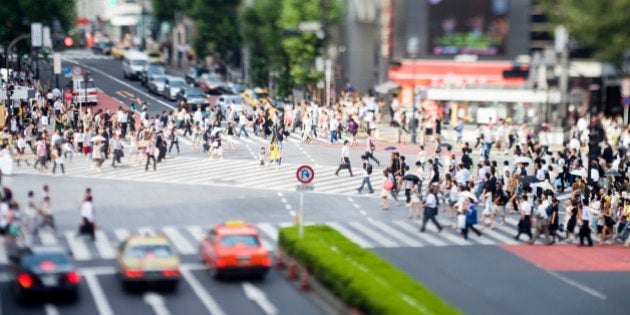 Famous six way pedestrian crossing photographed with tilt lens in Shibuya, Tokyo, Japan