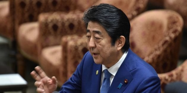 Japan's Prime Minister Shinzo Abe answers questions during a budget committee session of the House of Representatives at the Diet in Tokyo on February 24, 2017. / AFP / Kazuhiro NOGI (Photo credit should read KAZUHIRO NOGI/AFP/Getty Images)