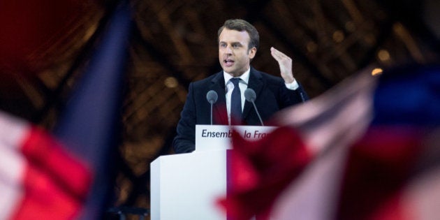 PARIS, FRANCE - MAY 07: Founder and Leader of the political movement 'En Marche !' Emmanuel Macron, elected new French President delivers a speech in front of thousands supporters, with the Louvre Pyramid behind him on May 7, 2017 in Paris, France. Against Marine Le Pen, National Front Party Leader, Macron won the election by a comfortable margin, becoming the new French President. (Photo by Aurelien Morissard/IP3/Getty Images)