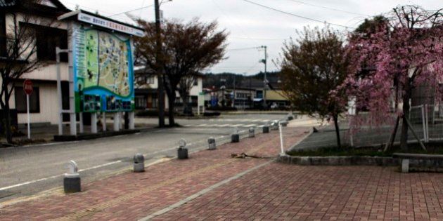 A bicycle is left near the station in the part of the town of Minamisoma, which is inside the 20-kilometer (12-mile) evacuation zone, in Fukushima Prefecture, Japan, Thursday, April 21, 2011. Japan declared the 20-kilometer (12-mile) area evacuated around its radiation-spewing nuclear power plant a no-go zone on Thursday, urging residents to abide by the order for their own safety or possibly face fines or detention. (AP Photo/Sergey Ponomarev)