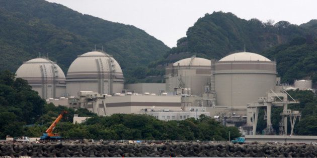 The No. 4, from left, No. 3, No. 2 and No. 1 reactor buildings stand at Kansai Electric Power Co.'s Ohi nuclear power station in Ohi Town, Fukui Prefecture, Japan, on Friday, June 1, 2012. Japan's government moved a step closer to resuming nuclear power generation after last year's Fukushima disaster left the country without atomic energy for the first time in more than four decades. Photographer: Tomohiro Ohsumi/Bloomberg via Getty Images