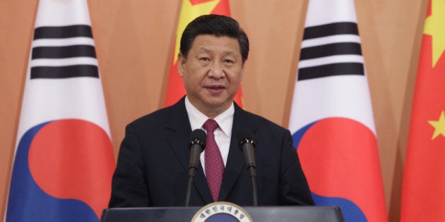 SEOUL, SOUTH KOREA - JULY 03: Chinese President Xi Jinping attends a joint press conference with South Korean President Park Geun-Hye (not pictured) at the presidential Blue House on July 3, 2014 in Seoul, South Korea. President Xi Jinping is visiting Seoul before Pyongyang during his first trip to Korean Peninsula as Chinese President. (Photo by Chung Sung-Jun/Getty Images)