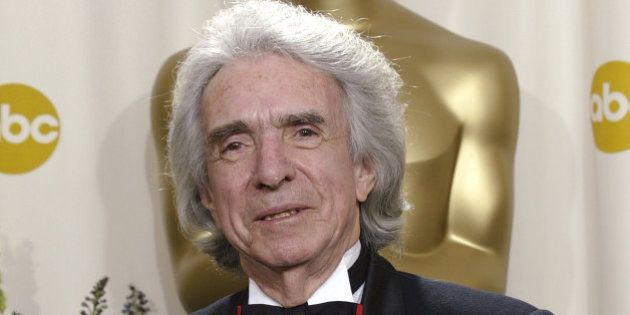 Winner of the Jean Hersholt Humanitarian Award Arthur Hiller poses with his Oscar trophy during the 74th annual Academy Awards on Sunday, March 24, 2002 in Los Angeles. (AP Photo/Doug Mills)