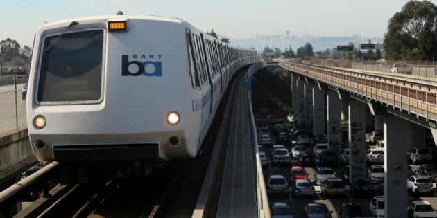 A Bay Area Rapid Transit (BART) train enters the platform area at the Rockridge station in Oakland, California February 12, 2015. Tens of thousands of commuters on San Francisco's Bay Area Rapid Transit system may have been exposed to measles after an infectious Bay Area resident rode a train to and from work for three days last week, public health officials said on Wednesday. REUTERS/Robert Galbraith (UNITED STATES - Tags: TRANSPORT HEALTH)