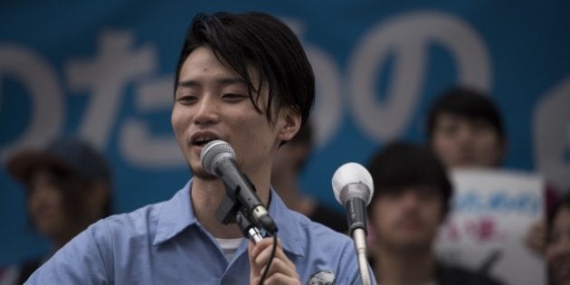 TOKYO, JAPAN - JUNE 19: SEALD's member Aki Okuda delivers a speech during the coalition's election event before the official start of the election campaign next week on June 19, 2016 in Tokyo, Japan. The Upper House election will held on 10th July 2016 in Japan. (Photo by Nicolas Datiche/Anadolu Agency/Getty Images)