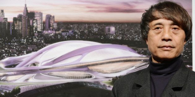 Japanese architect Tadao Ando, who is also chairman of the jury for an international design competition of the new national stadium, introduces a design by British architect Zaha Hadid during a press conference in Tokyo on November 15, 2012. The construction of the new stadium is scheduled to be completed in 2019, one year before the 2020 Olympic games which Tokyo aims at host city. AFP PHOTO/Toru YAMANAKA (Photo credit should read TORU YAMANAKA/AFP/Getty Images)