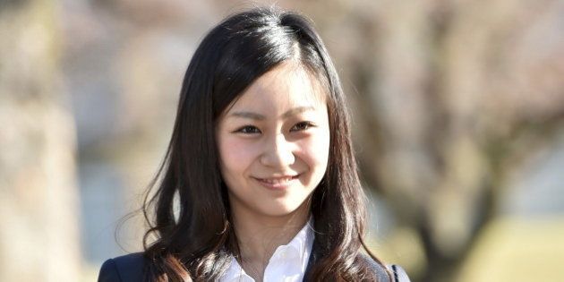 Japan's Princess Kako, the younger daughter of Emperor Akihito's second son Prince Akishino, poses as she arrives at the campus of International Christian University (ICU) for the entrance ceremony of the university in Tokyo April 2, 2015. Princess Kako enrolled in ICU's College of Liberal Arts after quitting Gakushuin University last year. REUTERS/Yoshikazu Tsuno/Pool