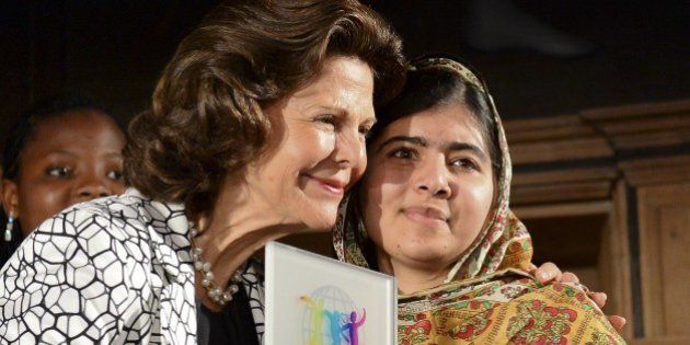 Pakistani activist for female education and Nobel Peace Prize laureate Malala Yousafzai (R) receives the 2014 World's Children Prize for the Rights of the Child from Queen Silvia of Sweden during an award ceremony at Gripsholm Castle in Mariefred, western Stockholm on October 29, 2014. AFP PHOTO / JONATHAN NACKSTRAND (Photo credit should read JONATHAN NACKSTRAND/AFP/Getty Images)