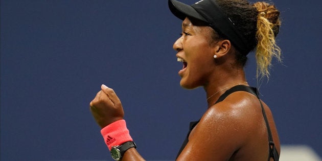 準決勝の第1セットを取り、ガッツポーズを見せる大坂なおみ=ニューヨーク