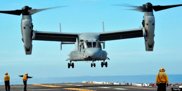 March 1, 2011 - A U.S. Marine Corps MV-22 Osprey aircraft prepares to land on the flight deck of amphibious assault ship USS Makin Island in the Pacific Ocean. This was the first Osprey landing on a west coast amphibious assault ship since the aircraft was introduced to the fleet.