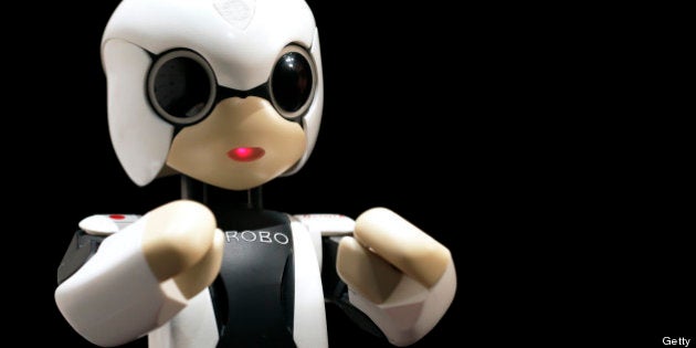 The Kirobo humanoid communication robot, jointly developed by Dentsu Inc., University of Tokyo, Robo Garage Co. and Toyota Motor Corp., stands on display during a news conference in Tokyo, Japan, on Wednesday, June 26, 2013. Toyota Motor Corp. said a robot it co-developed will have the first human-robot conversation in space as part of a project to make machines that can interact with and assist people living alone. Photographer: Kiyoshi Ota/Bloomberg via Getty Images