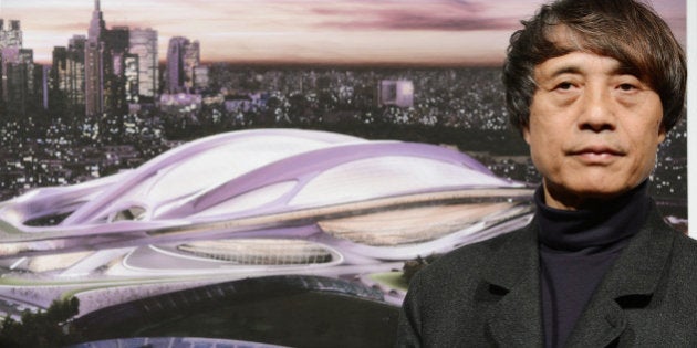 Japanese architect Tadao Ando, who is also chairman of the jury for an international design competition of the new national stadium, introduces a design by British architect Zaha Hadid during a press conference in Tokyo on November 15, 2012. The construction of the new stadium is scheduled to be completed in 2019, one year before the 2020 Olympic games which Tokyo aims at host city. AFP PHOTO/Toru YAMANAKA (Photo credit should read TORU YAMANAKA/AFP/Getty Images)