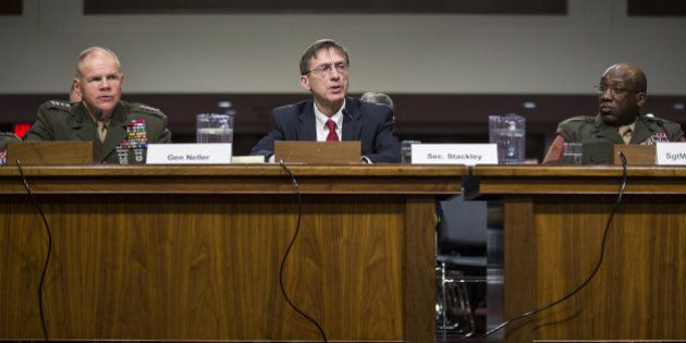 Sean Stackley, acting Secretary of the Navy, center, testifies while General Robert Neller, Commandant of the U.S. Marine Corps, left, and Ronald Green, Sergeant Major of the Marine Corps, right, listen during a Senate Committee on Armed Services hearing in Washington, D.C., U.S., on Tuesday, March 14, 2017. The committee questioned Neller about the Pentagon's investigation into the Marines United website, where members of the Corps shared nude pictures of female service members and other women. Photographer: Zach Gibson/Bloomberg via Getty Images
