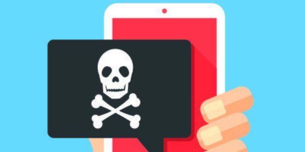 Hand holding smartphone with speech bubble and skull and bones on screen. Skull icon. Threats, mobile malware, spam messages, fraud, sms spam concepts. Modern flat design vector illustration