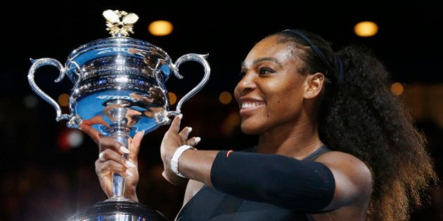 Tennis - Australian Open - Melbourne Park, Melbourne, Australia - 28/1/17 Serena Williams of the U.S. holds her trophy after winning her Women's singles final match against Venus Williams of the U.S. .REUTERS/Issei Kato TPX IMAGES OF THE DAY