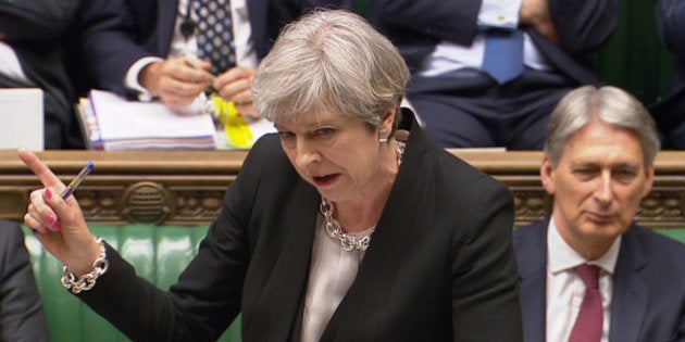 A still image from a video footage shows Britain's Prime Minister Theresa May addressing the House of Commons in central London April 19, 2017. Parbul TV/Handout via Reuters TV ATTENTION EDITORS - THIS IMAGE WAS PROVIDED BY A THIRD PARTY. EDITORIAL USE ONLY