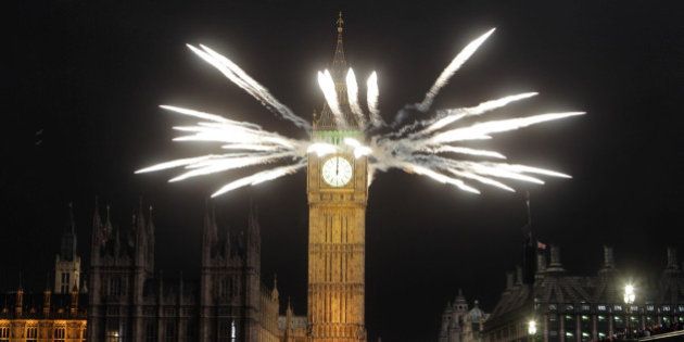 Fireworks explode from the top of St Stephen's Tower at the House of Parliament in London to celebrate the start of the new year.