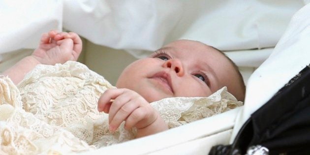 Britain's Princess Charlotte is pushed in a pram after her christening at St. Mary Magdalene Church in Sandringham, England, Sunday, July 5, 2015. (Chris Jackson, Pool Photo via AP)