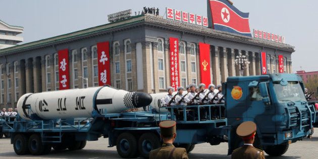 Military vehicles carry missiles with characters reading 'Pukkuksong' during a military parade marking the 105th birth anniversary of North Korea's founding father, Kim Il Sung, in Pyongyang, April 15, 2017. REUTERS/Sue-Lin Wong