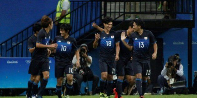 Japan's player Minamino (#18) celebrates after scoring against Nigeria during the football match between Japan and Nigeria for the Olympic Games Rio 2016 in Arena Amazonia, Manaus, Brazil, August 4th, 2016 / AFP PHOTO / Raphael Alves / AFP / RAPHAEL ALVES (Photo credit should read RAPHAEL ALVES/AFP/Getty Images)