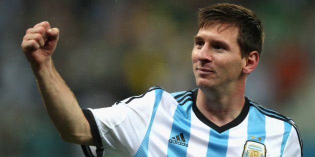 SAO PAULO, BRAZIL - JULY 09: Lionel Messi of Argentina celebrates defeating the Netherlands in a shootout during the 2014 FIFA World Cup Brazil Semi Final match between the Netherlands and Argentina at Arena de Sao Paulo on July 9, 2014 in Sao Paulo, Brazil. (Photo by Clive Rose/Getty Images)