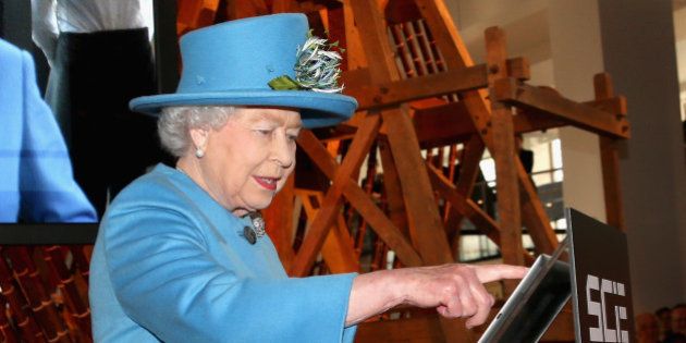 LONDON, ENGLAND - OCTOBER 24: Queen Elizabeth II sends her first Tweet during a visit to the 'Information Age' Exhibition at the Science Museum on October 24, 2014 in London, England. (Photo by Chris Jackson/Getty Images)