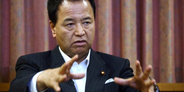 Akira Amari, Japan's minister of state for economic and fiscal policy, gestures as he speaks during an interview in Tokyo, Japan, on Tuesday, June 18, 2013. Japan isn't setting its policies to 'pander' to markets, which will follow if the economy improves, Amari said. Photographer: Tomohiro Ohsumi/Bloomberg via Getty Images