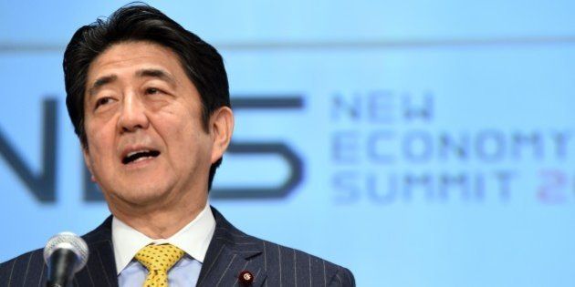 Japanese Prime Minister Shinzo Abe delivers a remarks during the opening of the New Economy Summit 2015 in Tokyo on April 7, 2015. The two-day New Economy Summit 2015 hosted by Japan Association of New Economy held here with over 20 speaker delivering their remarks. AFP PHOTO / TOSHIFUMI KITAMURA (Photo credit should read TOSHIFUMI KITAMURA/AFP/Getty Images)
