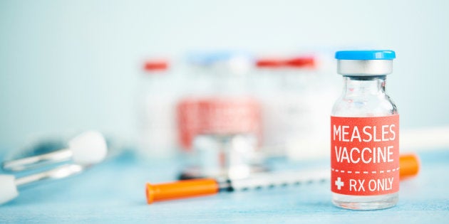 Stethoscope and Syringe with Measles Vaccine