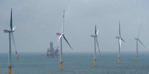 BORKUM, GERMANY - JUNE 23: Wind turbines stand at the nearly completed Riffgat offshore wind farm in...
