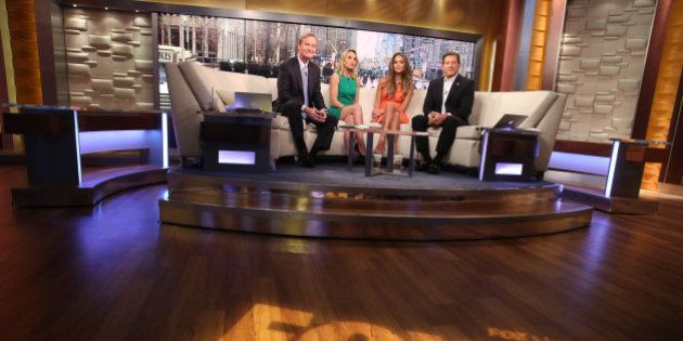NEW YORK, NY - FEBRUARY 10: (L-R) Steve Doocy, Elisabeth Hasselbeck, Hannah Davis and Eric Bolling appear on 'FOX and Friends' at FOX Studios on February 10, 2015 in New York City. (Photo by Rob Kim/Getty Images)