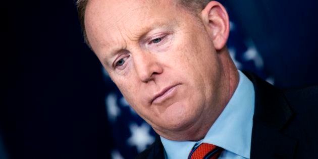White House Press Secretary Sean Spicer listens to a question during a briefing at the White House April 11, 2017 in Washington, DC. / AFP PHOTO / Brendan Smialowski (Photo credit should read BRENDAN SMIALOWSKI/AFP/Getty Images)