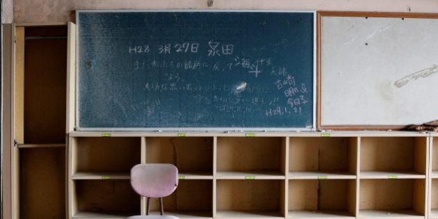 A classroom at Ukedo elementary school, damaged by the March 11, 2011 tsunami, is seen near Tokyo Electric Power Co's (TEPCO) tsunami-crippled Fukushima Daiichi nuclear power plant in Namie town, Fukushima prefecture, Japan, March 1, 2017. REUTERS/Toru Hanai SEARCH