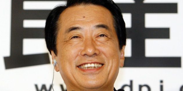 Naoto Kan, acting leader of the main oppsition Democratic Party of Japan (DPJ), smiles as he answers questions from a live television program after the Upper House elections, at party headquarters in Tokyo, 29 July 2007. Japanese Prime Minister Shinzo Abe's government suffered a crushing defeat in upper house elections but the conservative leader insisted he would stay in power. AFP PHOTO/Toru YAMANAKA (Photo credit should read TORU YAMANAKA/AFP/Getty Images)