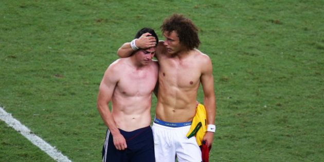 FORTALEZA, BRAZIL - JULY 04: David Luiz of Brazil consoles James Rodriguez of Colombia after Brazil's 2-1 win during the 2014 FIFA World Cup Brazil Quarter Final match between Brazil and Colombia at Castelao on July 4, 2014 in Fortaleza, Brazil. (Photo by Michael Steele/Getty Images)