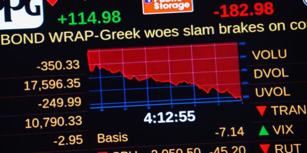 NEW YORK, NY - JUNE 29: A headline concerning Greece's debt crisis scrolls across a stock ticker at the New York Stock Exchange in the afternoon on June 29, 2015 in New York City. The Dow plunged 300 points as the Greek debt crisis worsened amid fears that Greece will be unable to pay the almost $1.8 billion that it owes the International Monetary Fund on Tuesday. (Photo by Bryan Thomas/Getty Images)