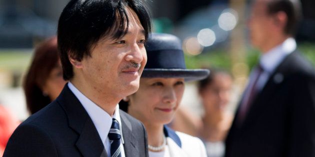 Prince Akishino and his wife Princess Kiko attend a wreath laying ceremony in homage to Argentina's national hero Gen. Jose de San Martin in Buenos Aires, Argentina, Friday, Jan. 31, 2014. The royal couple is on a three-day visit to Argentina. (AP Photo/Victor R. Caivano)