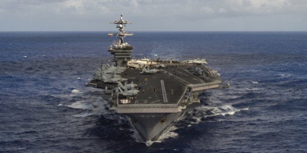 The aircraft carrier USS Carl Vinson (CVN 70) transits the Pacific Ocean January 30, 2017. U.S. Navy Photo by Mass Communication Specialist 3rd Class Tom Tonthat/Handout via Reuters ATTENTION EDITORS - THIS IMAGE WAS PROVIDED BY A THIRD PARTY. EDITORIAL USE ONLY. TPX IMAGES OF THE DAY