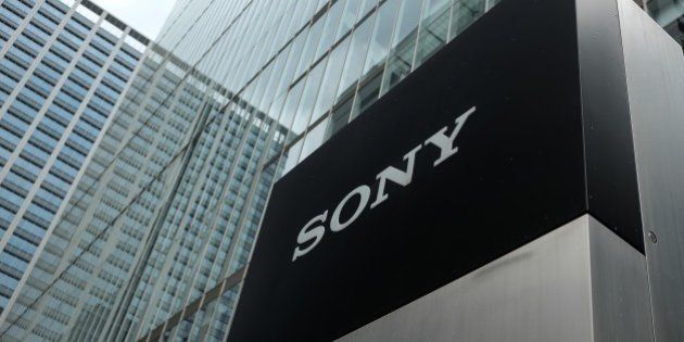 The logo of the Sony Corporation is displayed at an entrance to the company's headquarters in Tokyo on July 30, 2015. Sony said on July 30 its April-June net profit more than tripled as videogames and smartphone component sales got a lift, with the company emerging from a painful corporate restructuring that included layoffs and asset sales. AFP PHOTO / KAZUHIRO NOGI (Photo credit should read KAZUHIRO NOGI/AFP/Getty Images)