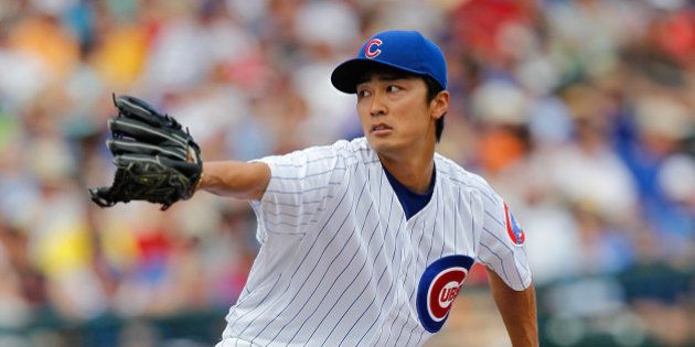 GOODYEAR, AZ - MARCH 25: Tsuyoshi Wada #67 of the Chicago Cubs pitches during a game against the Los Angeles Angels at Goodyear Ballpark on March 25, 2014 in Goodyear, Arizona. (Photo by Sarah Glenn/Getty Images)
