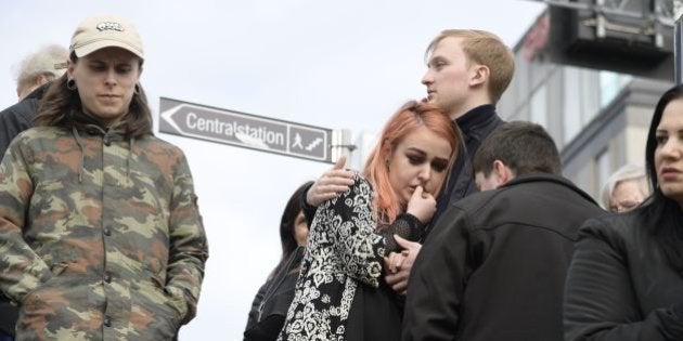 People react at the scene where a truck crashed into the Ahlens department store at Drottninggatan in central Stockholm, April 7, 2017. / AFP PHOTO / TT News Agency / Andreas Schyman / Sweden OUT (Photo credit should read ANDREAS SCHYMAN/AFP/Getty Images)