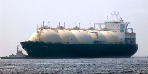 JAPAN - JUNE 20: A liquefied-natural-gas (LNG) tanker, leaves a berth in Yokohama City, Kanagawa Prefecture, Japan, on Saturday, June 20, 2009. The world LNG market is likely to face supply shortages around 2013 as new projects fail to keep pace with supply, according to Wood Mackenzie, a U.K. energy research and consulting company. (Photo by Kimimasa Mayama/Bloomberg via Getty Images)