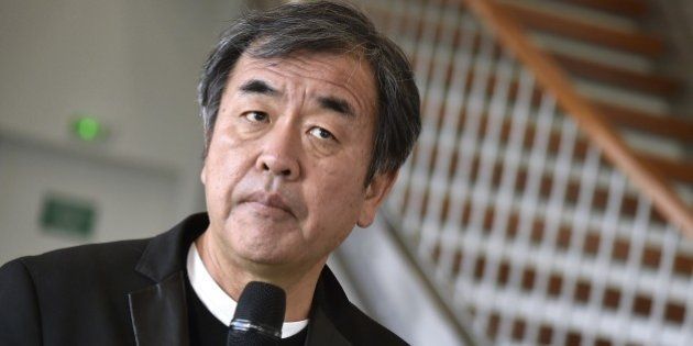 Kengo Kuma, the Japanese architect of the future Saint-Denis Pleyel train station, delivers a press conference in Saint-Denis on September 22, 2015. AFP PHOTO / DOMINIQUE FAGET (Photo credit should read DOMINIQUE FAGET/AFP/Getty Images)