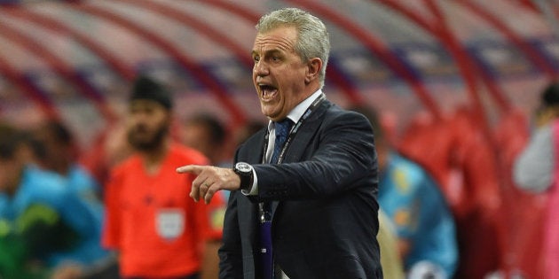 SINGAPORE - OCTOBER 14: Japan head coach Javier Aguirre looks on during the international friendly match between Japan and Brazil at the National Stadium on October 14, 2014 in Singapore. (Photo by Masterpress/Getty Images)