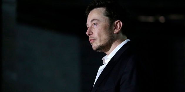 CHICAGO, IL - JUNE 14: Engineer and tech entrepreneur Elon Musk of The Boring Company listens as Chicago Mayor Rahm Emanuel talks about constructing a high speed transit tunnel at Block 37 during a news conference on June 14, 2018 in Chicago, Illinois. Musk said he could create a 16-passenger vehicle to operate on a high-speed rail system that could get travelers to and from downtown Chicago and O'hare International Airport under twenty minutes, at speeds of over 100 miles per hour. (Photo by Joshua Lott/Getty Images)