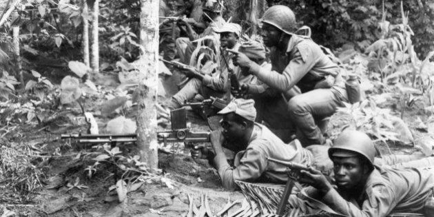 LAGOS, NIGERIA - AUGUEST 16: Biafran National army soldiers prepare to resist a Federal troop attack in the Biafra region in south-eastern Nigeria, where a civil war opposing Biafra tribes fighting for independance and the federal troops killed between one and two milllion people from 1967 and 1970.
