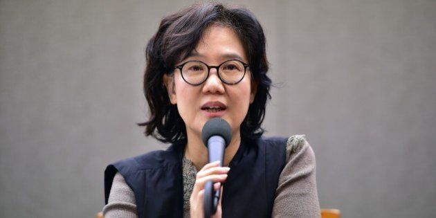 Park Yu-Ha, a literature professor at South Korea's Sejong University, speaks during a press conference on her controversial book 'The Comfort Women of the Empire,' in Seoul on December 2, 2015. The South Korean academic facing trial on charges of defaming wartime sex slaves -- or 'comfort women' -- in a recent book, accused prosecutors of distorting her work. AFP PHOTO / JUNG YEON-JE / AFP / JUNG YEON-JE (Photo credit should read JUNG YEON-JE/AFP/Getty Images)