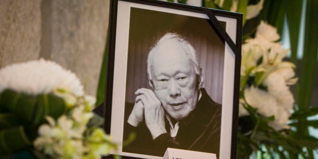 A picture of Singapore's founding father, Lee Kuan Yew is displayed at the Singaporean embassy in Kuala Lumpur, Malaysia on Tuesday, March 24, 2015. Lee Kuan Yew, who founded modern Singapore and was both feared for his authoritarian tactics and admired for turning the city-state into one of the world's richest nations, died Monday, the Singapore government said. He was 91. (AP Photo/Joshua Paul)