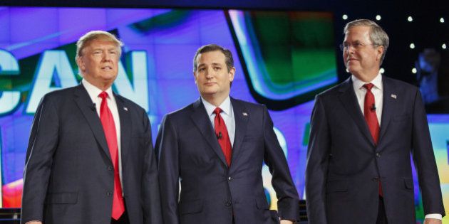 2016 Republican presidential candidates Donald Trump, president and chief executive of Trump Organization Inc., from left, Senator Ted Cruz, a Republican from Texas, and Jeb Bush, former governor of Florida, stand on stage at the start of the Republican presidential candidate debate at The Venetian in Las Vegas, Nevada, U.S., on Tuesday, Dec. 15, 2015. With less than two months remaining before the Feb. 1 Iowa caucuses and the Feb. 9 New Hampshire primary, middle-of-the-pack candidates hoping for a late surge in the polls have little choice but to come out swinging in tonight's fifth Republican debate. Photographer: Patrick T. Fallon/Bloomberg via Getty Images